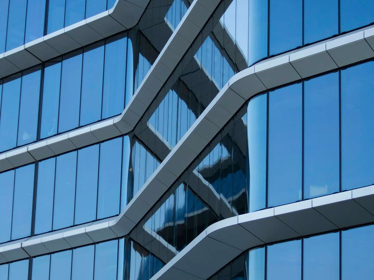 A building with a glass façade.